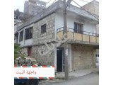 للبيع عقار كامل بيت عربي مع سطح على الطريق العام
