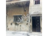 للبيع بيت طابقين بحي المهاجرين بحمص يبعد عن الشارع الرئيسي بيتين 
