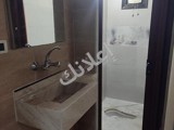 شقة أرضية بأكساء مرتب للبيع في حي القصور دمشق 