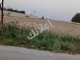للبيع ارض طريق لمطار جسر 5 نسق ثاني 25 دنم وجها طابو سعر دنم50الف